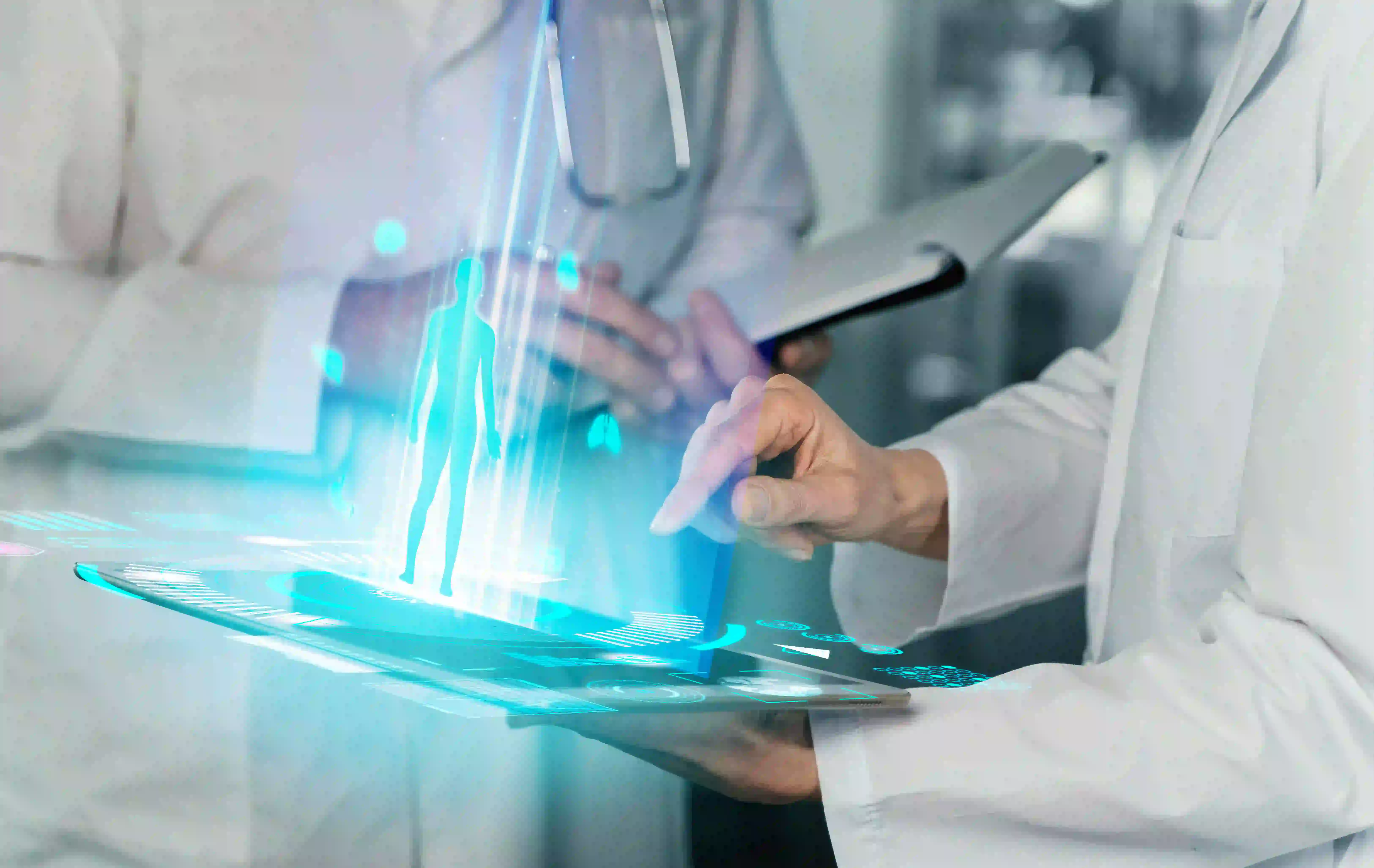 A person signs a document at a desk with medical-themed icons related to healthcare floating over the image. Items on the desk include a stethoscope, laptop, phone, and various papers. The icons represent concepts such as health tests, prescriptions, online medical services, and the benefits of hospital management systems